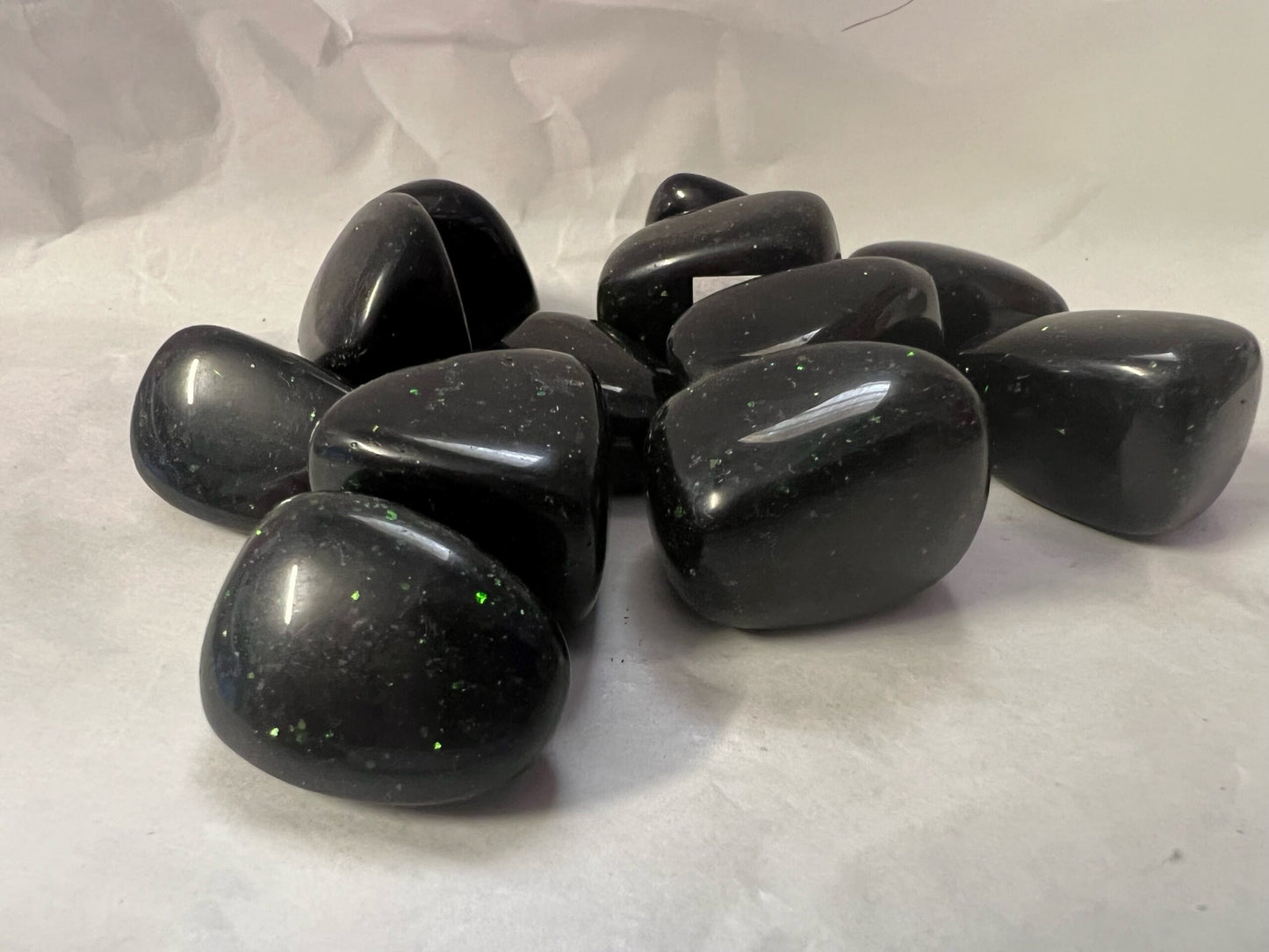 Green Goldstone tumbles