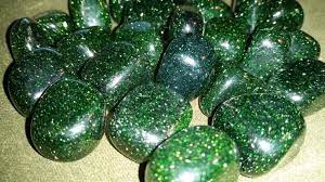 Green Goldstone tumbles