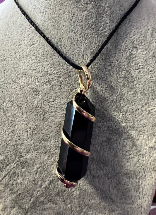 Wire wrapped crystal point necklace